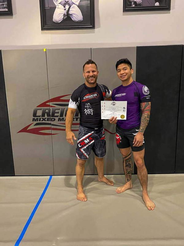 Christian Chua receives red belt in MMA