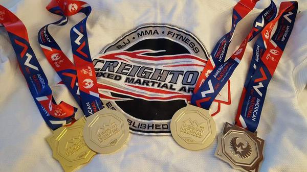 3 Golds and 1 Sliver for Alex!!