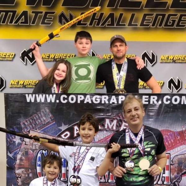 Talley and Owen's family at the Copa Grappling Championships