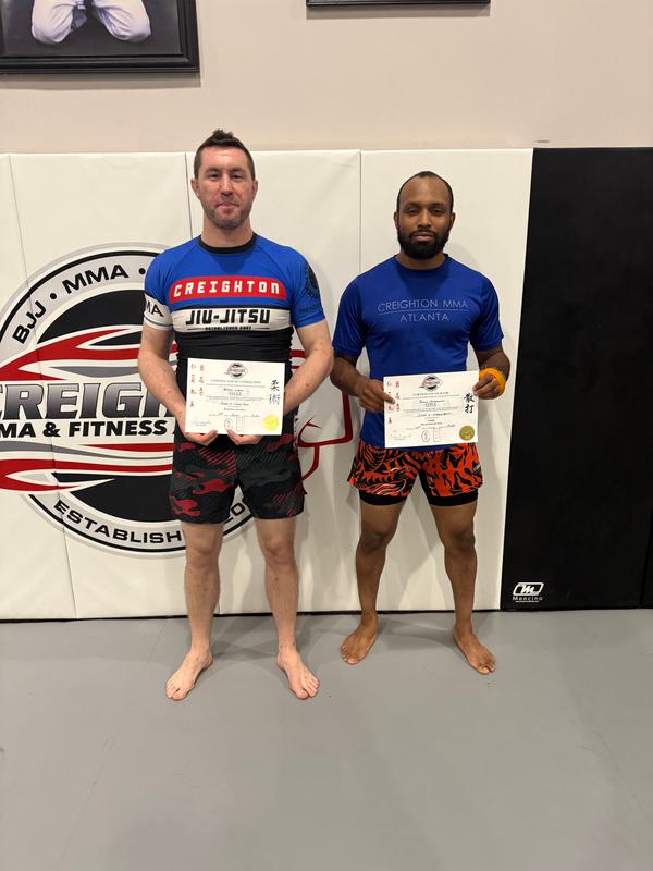 Aaron Sturdivant and Will Lynn were ranked to Green Belt in MMA at Creighton MMA's inner academy ranking system.