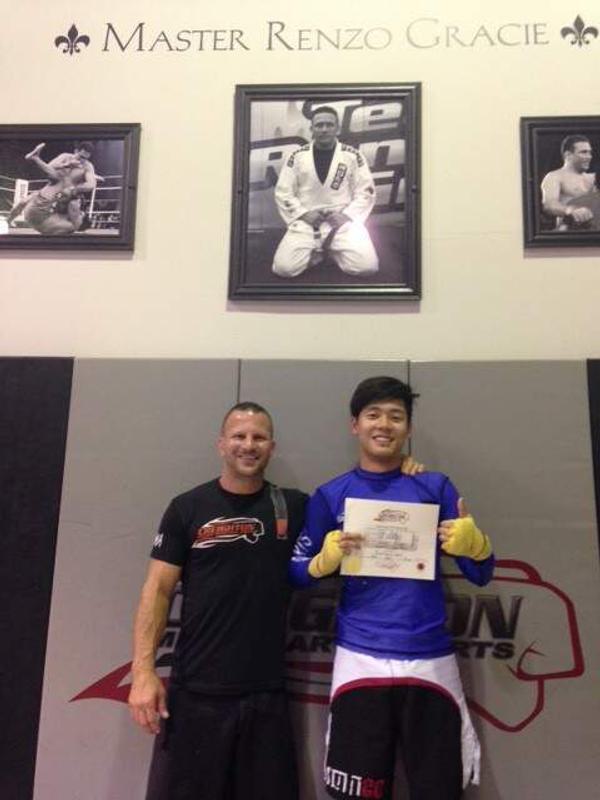 Our new GREEN belt in MMA
