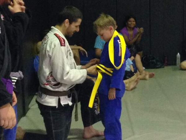 Nico Adams moves up to an advanced yellow belt in MMA / BJJ