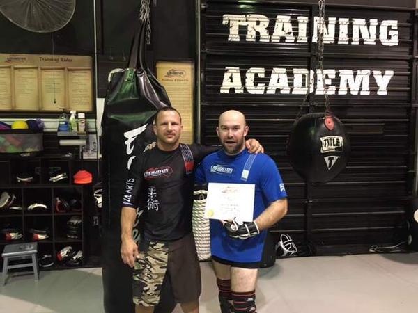Ryan Hicks earns his green belt